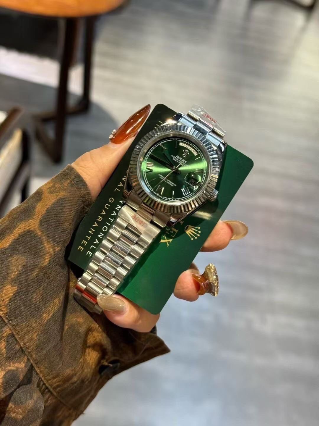Rolex Green Dial Fluted Bezel Watch — front